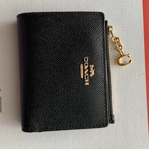 Coach black leather snap card case
